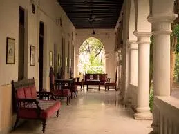 Guest Rooms with Yoga Mats, Bookshelf, and Filtered Water