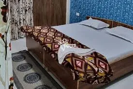 Secure Guest House with Biometric Access and Visitor Log