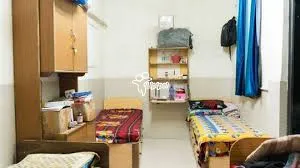 Spacious and Ventilated Boys’ PG Rooms with Comfortable Beds and Wi-Fi