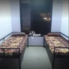 Fully Furnished PG Rooms with Laundry, Housekeeping, and Meal Services