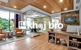 Affordable office for rent with reception desk, waiting area, and work